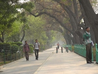 Strolling Visitors At Tilak Marg
